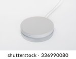 Wireless charger isolated on white background. Accessory for smartphone or tablet.