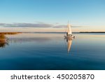 Sailing Boat On A Calm Lake...