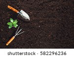 Gardening Tools On Fertile Soil ...