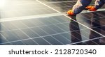 Small photo of Close-up of solar cell, installing solar cell farm power plant eco technology. Solar cell panels in a photovoltaic power plant. Concept work of sustainable resources hands worker installing solar cell