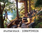 Ice age hiking trail and stone stairs in sunlight during sunset hours. Devil