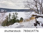 Scenic nature background. Beautiful winter landscape at Devils Lake State Park, Baraboo area, Wisconsin, USA. View on the lake from rocky south shore Ice age trail. Nature of Wisconsin, Midwest USA.