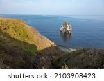 Small photo of Hvitserkur famous Rhino rock, a popular tourist attraction Vatnsnes peninsula. It's a basalt rock that resembles a rhino or elephant