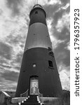 Small photo of A black and white image of Spurn Point Lighthouse in East Yorkshire.