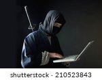 The ninja using a laptop
