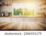 Small photo of Beautiful empty brown wooden table top and blurred defocused modern kitchen interior background with day light flare, product montage display