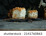 Small photo of Delicious cold cheesecake with pineapple and biscuits. A delicate and very velvety cold dessert.