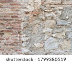 Small photo of Brick and stone wall. Aleatory mix