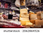 Small photo of Italian food market with cheese and pepperoni, formaggio crociato fresco, Tuscan delicatessen stall display, Florence, Italy