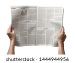 Small photo of Hands holding the Business Newspaper isolated on white background, Daily Newspaper mock-up concept