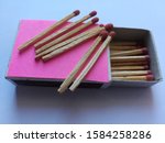 Small photo of Starting fire from match. Match and hand. Make the fire from matchsticks. Matchsticks with white background.matchstick,matchs.