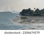 Small photo of Qanater, Egypt. December 18th, 2022. Hazy polluted air view from the El Qanater Barrage, on the River Nile at the Delta Barrages, the Nile River divides into the Damietta and Western Rosetta branches