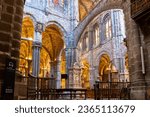 Small photo of Avila, Spain, 07.10.21. Cathedral of Avila (Cathedral of the Saviour) inside view with gothic architecture, columns, vaults and stained glass windows.