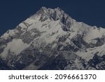 Small photo of Kangchenjunga, also spelled Kanchenjunga, is the third highest mountain in the world. It rises with an elevation of 8,586 m in a section of the Himalayas called Kangchenjunga Himal delimited in the we