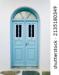 Old Blue Wooden Door Against...