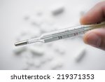 Medical mercury thermometer. Medical mercury thermometer showing elevated body temperature.