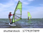 teenage girl riding windsurf... | Shutterstock . vector #1779297899