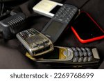 Small photo of Old used mobile phones working in 2g and 3g technology