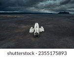 Abandoned military DC 3 plane wreck on Solheimasandur black sand beach in Iceland