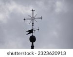 Weather vane on top of the bell ...