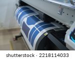 Small photo of Interior factory Large printing machine for paper business in printing room. Sublimation concept.