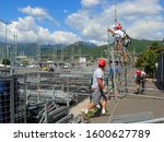 Small photo of Salerno,SA,Italy - May 13,2013 :Workers build the stage where guests will talk of the sixty-first national gathering of targets held in the city of Salerno