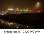 Small photo of Copenhagen, Denmark Oct 30, 2022 The Queen Louise Bridge or Dronning Louises Bro on a foggy night.
