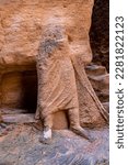 Small photo of Petra, Jordan The remaining half body statue from the Nabatean period of a tribesman carved in the sandstone rock.