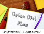 Weightloss concept meaning Detox Diet Plan with inscription on the sheet.