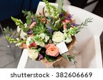 Small photo of Delivery of a white roses, eucalyptus, a succulent, veronika, callas, antirrinumy bouquet with greeting card