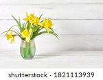 Yellow Daffodils At Glass Vase...