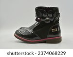 Small photo of Girlie winter black boots shot on white background