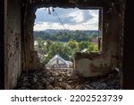 Small photo of Irpin Ukraine 2022: Destroyed apartments after the air raid. Inside view. Ruins during Russia's war against Ukraine. High quality photo