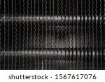 Abstract background in the form of vertical wavy lines with two broad silver stripes intersecting them.
