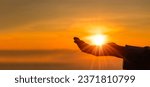 Small photo of Silhouette of prayer woman worship God in the morning with sunrise sky background. Person hands open palm up worship. God helping repent catholic easter lent mind pray. Christian religion concept.