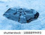 View of a hole in a frozen lake