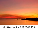 Small photo of Colorfull Darwin Sunset. Orange , yellow, purple vivid colors. Fannie bay, Darwin, Northern Territory, Australia