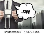 Small photo of J2EE text on speech bubble with businessman