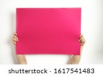 A large sheet of red paper in...