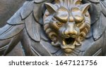 Door knocker with head of lion.