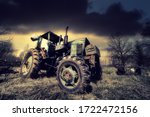 old tractor on the grass field