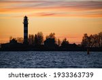 Seascape at sunset. lighthouse...
