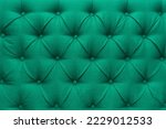 Green leather upholstery sofa pattern button design furniture style decor texture background decoration vintage abstract.