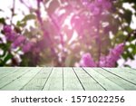 Wood Board And Blurred Lilac...