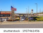 Small photo of Columbia County, Ga USA - 02 23 21: Chick fil A restaurant Governor ordering flags half-staff for Rush Limbaugh