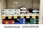 Small photo of Grovetown, Ga USA - 02 16 22: Food lion Grocery store 2022 cigarette case and prices marlboro and lm