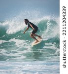 Small photo of Mirissa, Sri Lanka - 04 09 2022: Beautiful cutback maneuver done by the skilled male surfer close-up shot.