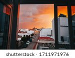 Street Of A Town At Sunset With ...