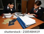 Small photo of Saint Petersburg-Russia - 16.06.2022: Aviation industry. Flight attendants of Transaero Airlines ata pre-flight briefing. Translation: Flight Attendant's certificate