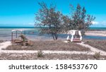 Small photo of Idyllic beach destination in Mozambique, Nampula provenience, with view on the pristine blue lagoon and white sand beach
